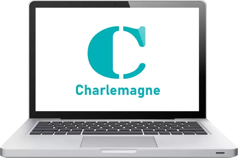 Témoignage OGEC Institut Les Tourelle Image avec un pc portable avec inscrit Charlemagne
